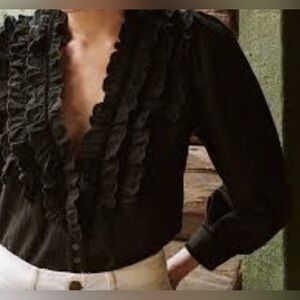 Black ruffled blouse by the Great.